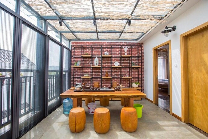 Imagen de los interiores del Hotel Chunan Qishe Botique Guest House. Foto 5