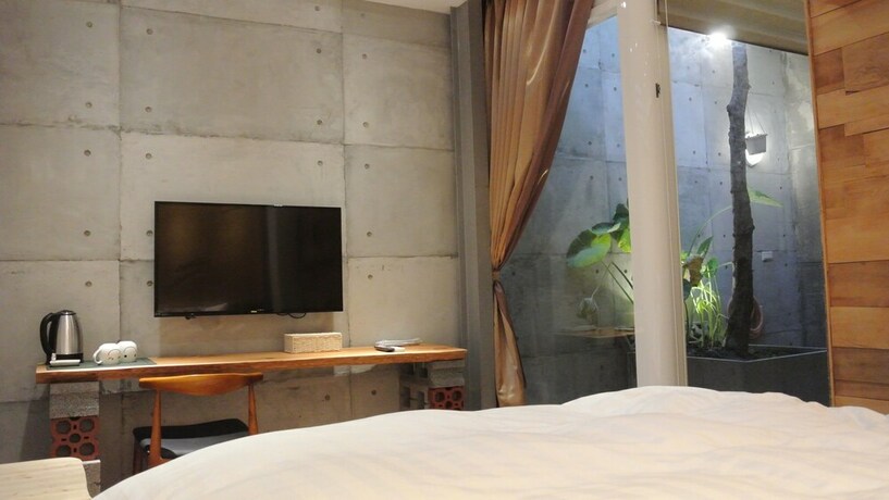 Imagen de la habitación del Hotel Chung Fu Inn. Foto 24