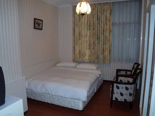 Imagen de la habitación del Hotel Chung Shan Business. Foto 8