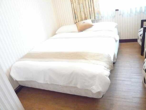 Imagen de la habitación del Hotel Chung Shan Business. Foto 9
