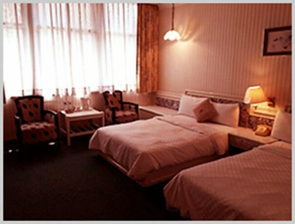 Imagen de la habitación del Hotel Chung Shan Business. Foto 10