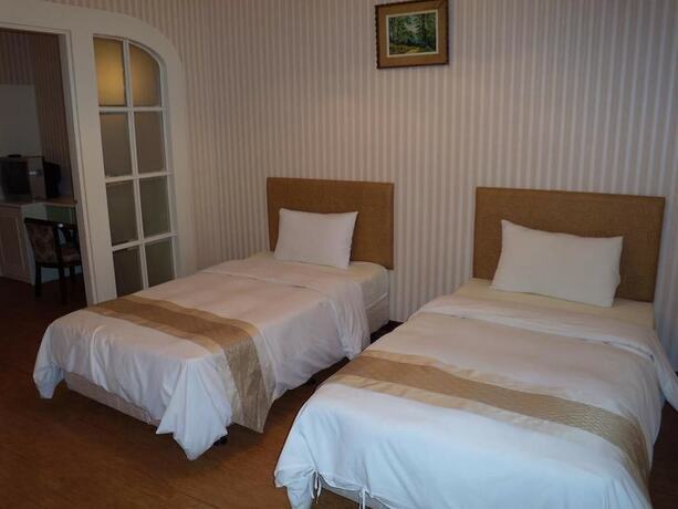 Imagen de la habitación del Hotel Chung Shan Business. Foto 12