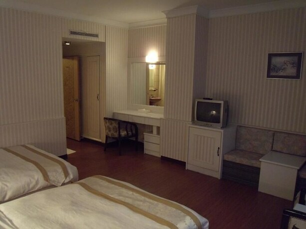 Imagen de la habitación del Hotel Chung Shan Business. Foto 13