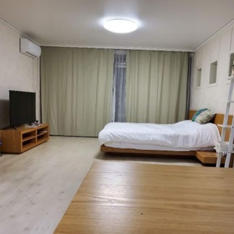 Imagen de la habitación del Hotel Chungdamhill House. Foto 10