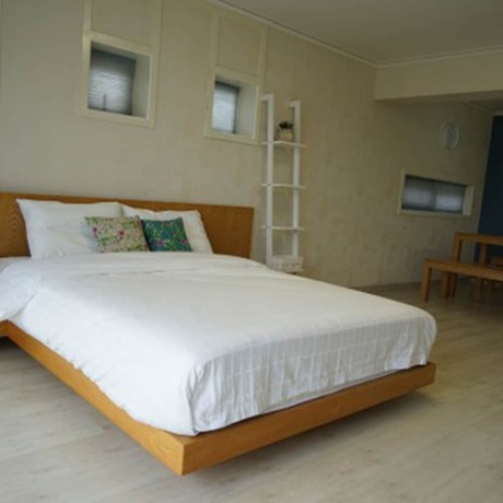 Imagen de la habitación del Hotel Chungdamhill House. Foto 13