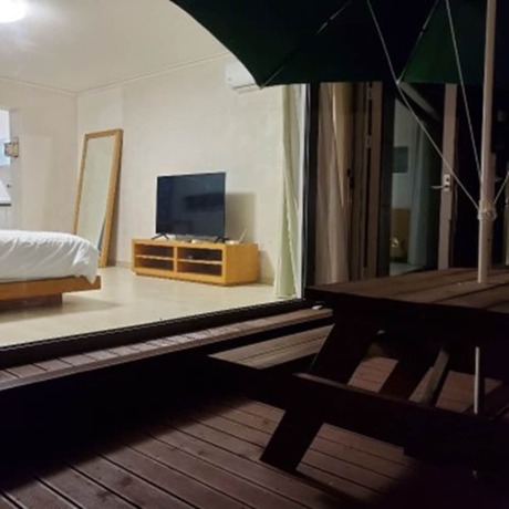 Imagen de la habitación del Hotel Chungdamhill House. Foto 16