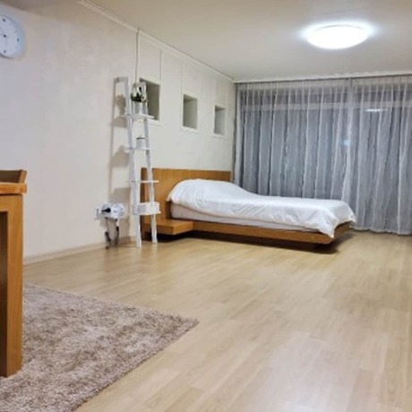 Imagen de la habitación del Hotel Chungdamhill House. Foto 19