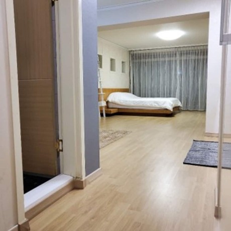 Imagen de la habitación del Hotel Chungdamhill House. Foto 20