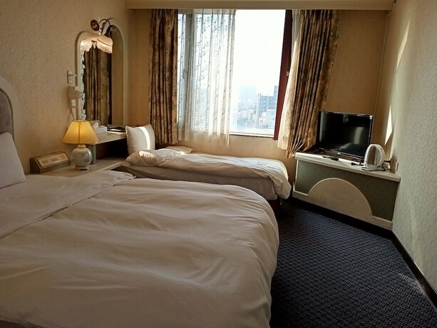 Imagen de la habitación del Hotel Chungli Business. Foto 16