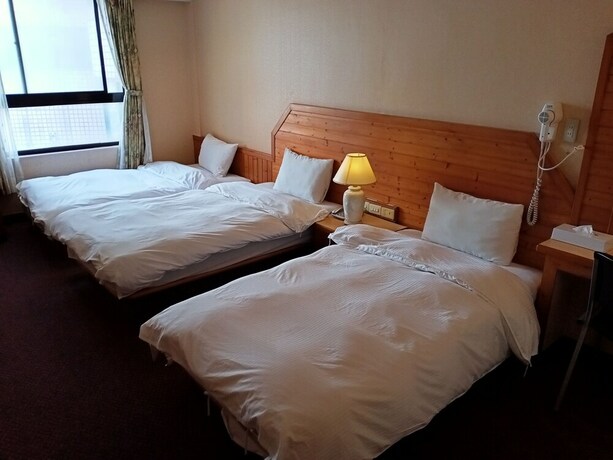 Imagen de la habitación del Hotel Chungli Business. Foto 25