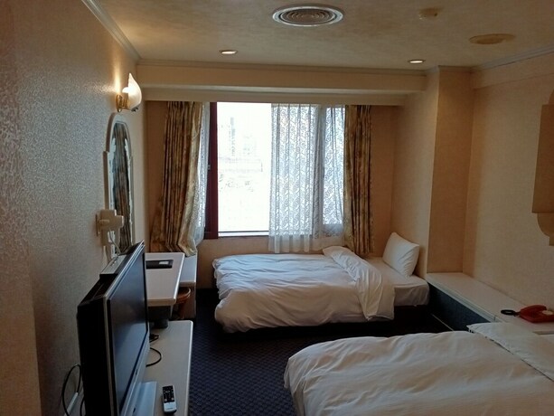 Imagen de la habitación del Hotel Chungli Business. Foto 26