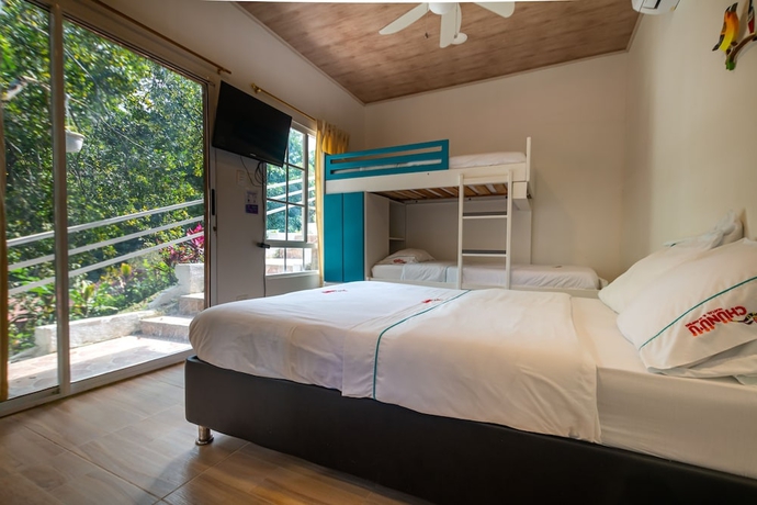 Imagen de la habitación del Hotel Chunuu Hostal y Glamping Minca. Foto 8