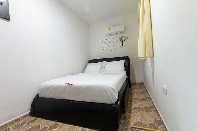 Imagen de la habitación del Hotel Chunuu Hostal y Glamping Minca. Foto 11