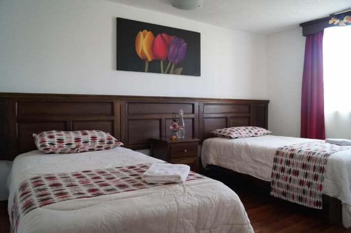 Imagen de la habitación del Hotel Chuquiragua Lodge and Spa. Foto 14
