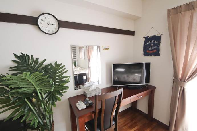 Imagen de la habitación del Hotel Chura Gahna House Tsubogawa Naha. Foto 10
