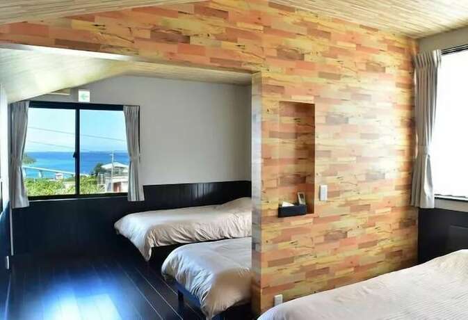 Imagen de la habitación del Hotel Churaumi Kafuu Terrace. Foto 18