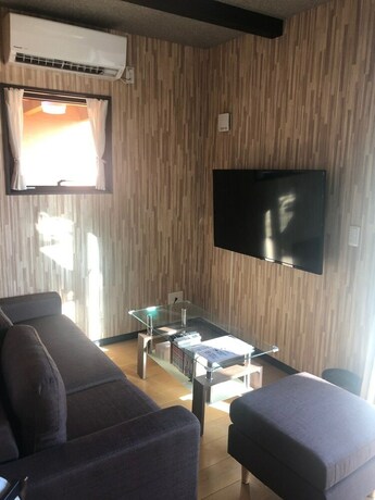 Imagen de la habitación del Hotel Churaumi Kafuu Terrace. Foto 19
