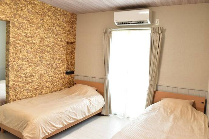 Imagen de la habitación del Hotel Churaumi Kafuu Terrace. Foto 23