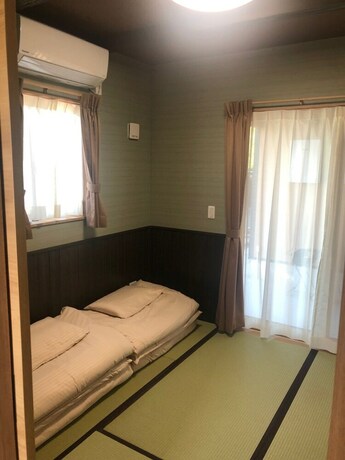 Imagen de la habitación del Hotel Churaumi Kafuu Terrace. Foto 28