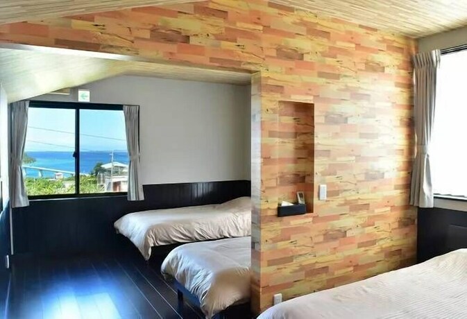 Imagen de la habitación del Hotel Churaumi Kafuu Terrace. Foto 29
