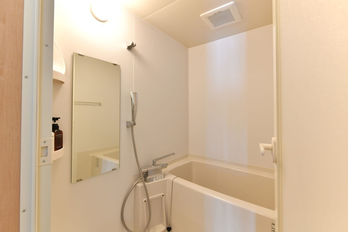 Imagen de la habitación del Hotel Churaumi On The Beach Motobu. Foto 19