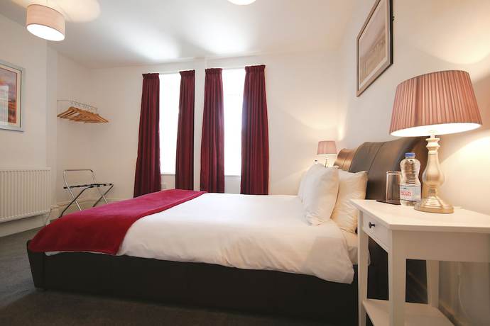 Imagen de la habitación del Hotel Church Guest House. Foto 15