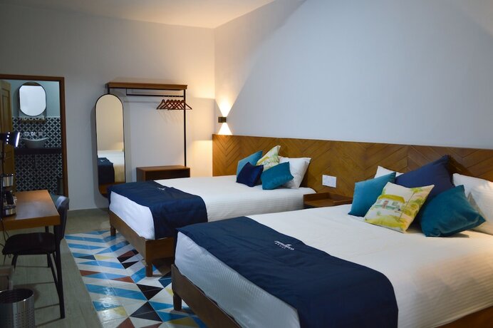 Imagen de la habitación del Hotel Churumuco. Foto 18