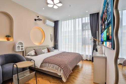 Imagen de la habitación del Hotel Chuxin Moshe. Foto 18