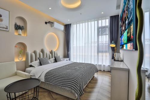 Imagen de la habitación del Hotel Chuxin Moshe. Foto 19
