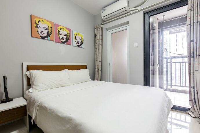 Imagen de la habitación del Hotel CiCi House. Foto 16