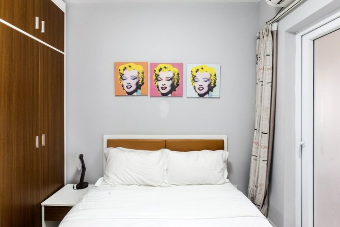 Imagen de la habitación del Hotel CiCi House. Foto 19