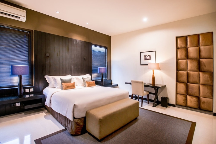 Imagen de la habitación del Hotel Cicada Luxury Townhouses. Foto 3