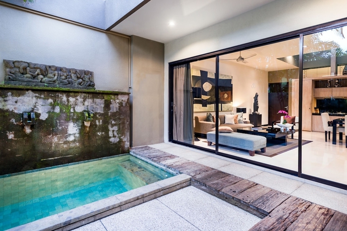 Imagen de la habitación del Hotel Cicada Luxury Townhouses. Foto 8