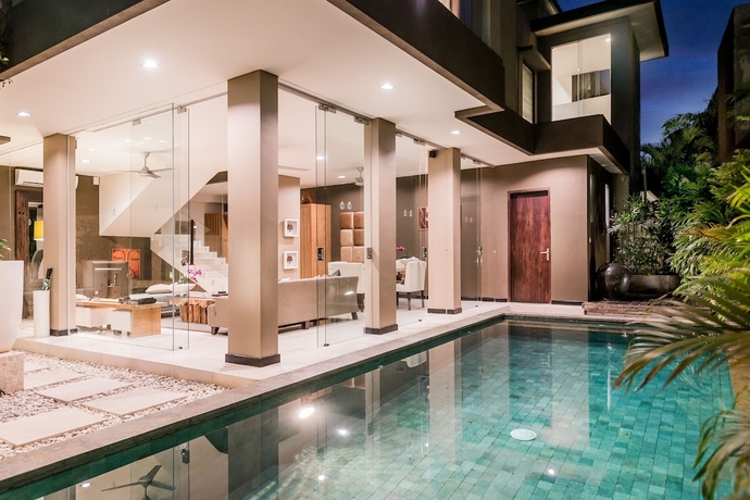 Imagen de la habitación del Hotel Cicada Luxury Townhouses. Foto 10