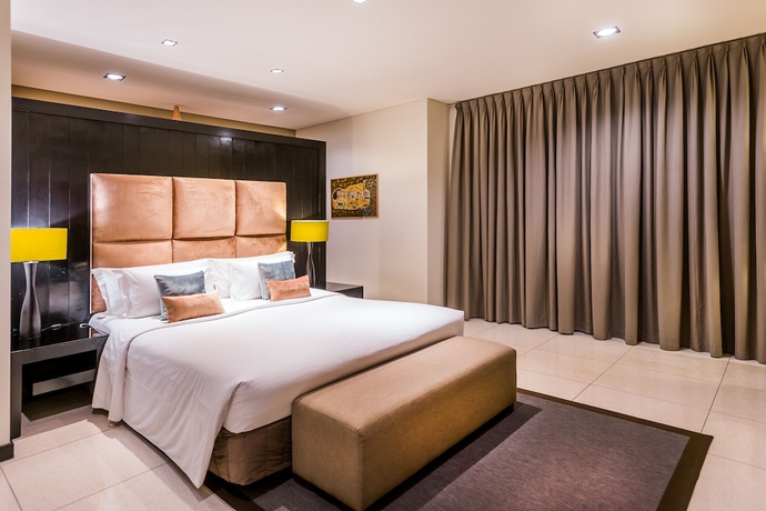 Imagen de la habitación del Hotel Cicada Luxury Townhouses. Foto 11