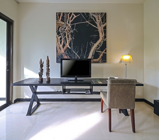 Imagen de la habitación del Hotel Cicada Luxury Townhouses. Foto 12