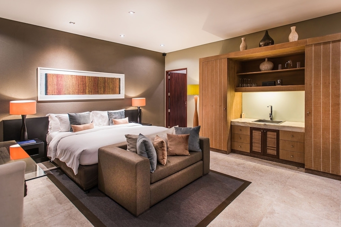 Imagen de la habitación del Hotel Cicada Luxury Townhouses. Foto 14