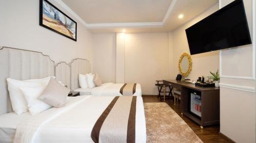 Imagen de la habitación del Hotel Cicilia City Saigon Center. Foto 6