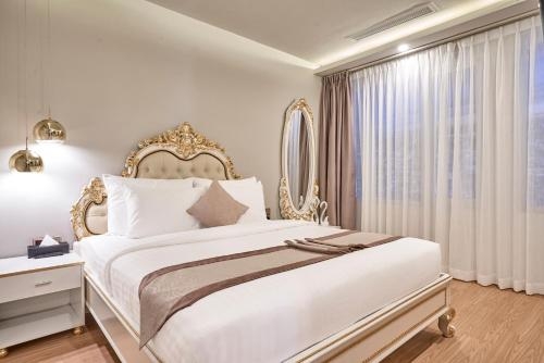 Imagen de la habitación del Hotel Cicilia City Saigon Center. Foto 10