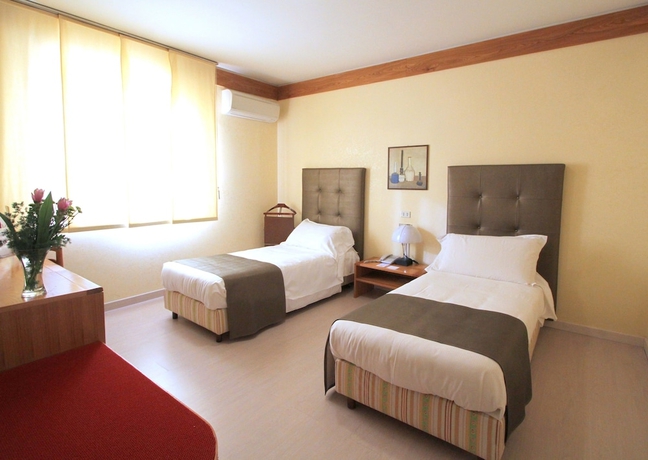 Imagen de la habitación del Hotel Cicolella. Foto 14