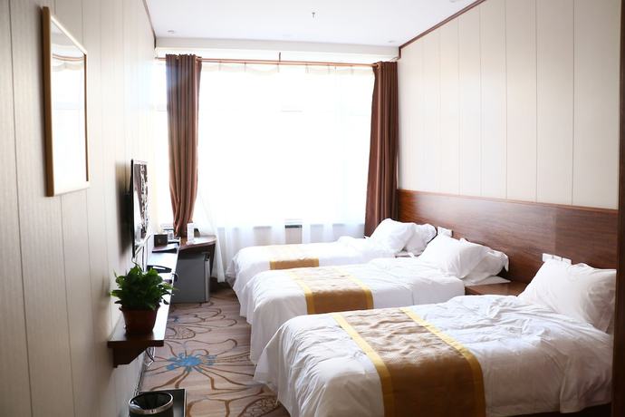 Imagen de la habitación del Hotel Cihang Home. Foto 2