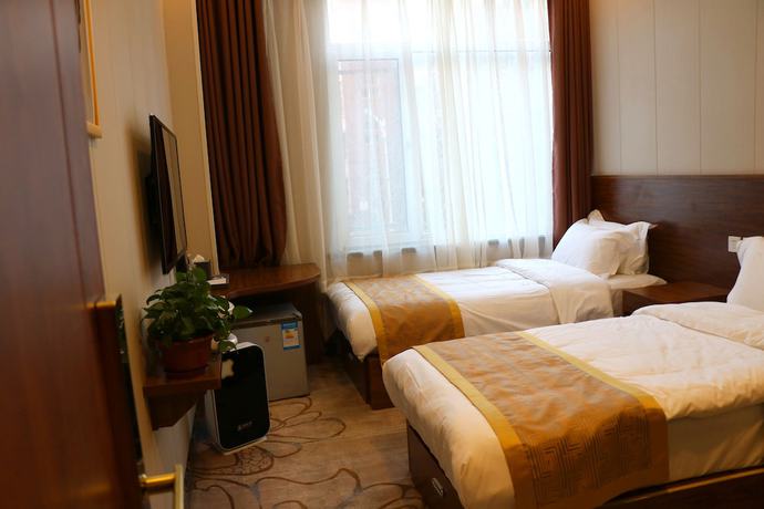 Imagen de la habitación del Hotel Cihang Home. Foto 3