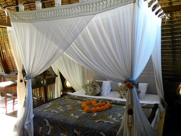Imagen de la habitación del Hotel Cili Emas Oceanside Resort. Foto 19