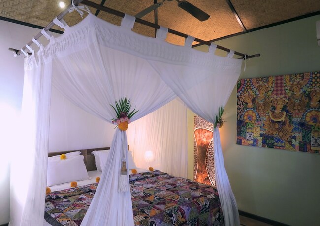 Imagen de la habitación del Hotel Cili Emas Oceanside Resort. Foto 35