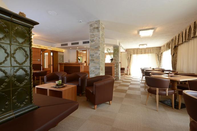 Imagen del bar/restaurante del Hotel Cimon Dolomites, Predazzo. Foto 2