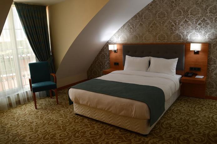 Imagen de la habitación del Hotel Cinarpark. Foto 2