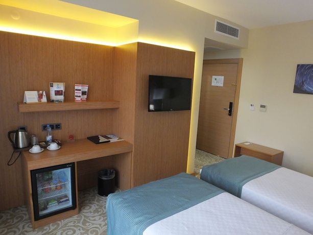 Imagen de la habitación del Hotel Cinarpark. Foto 7