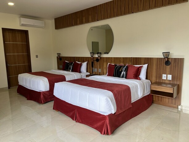 Imagen de la habitación del Hotel Cinco Diamantes. Foto 20