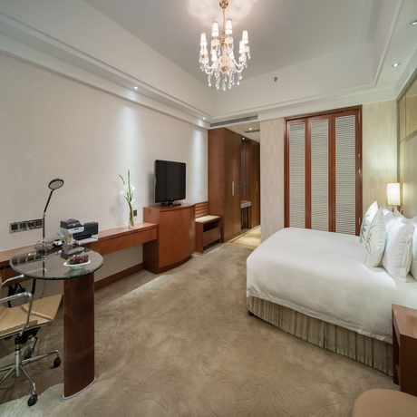Imagen de la habitación del Hotel Cinese Dongguan Shijie. Foto 4