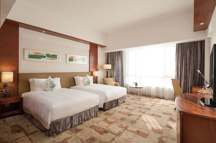 Imagen de la habitación del Hotel Cinese Dongguan Shijie. Foto 14